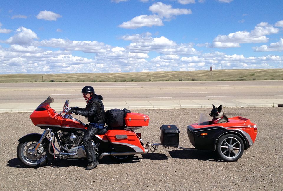 Man on a bike with a trailer