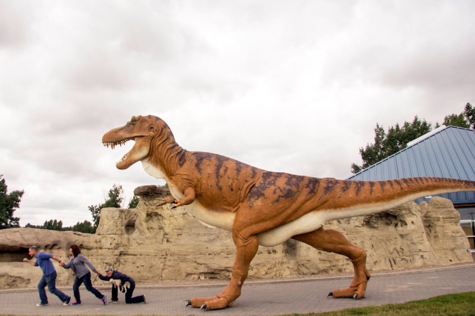 Kids being chased by the local TRex