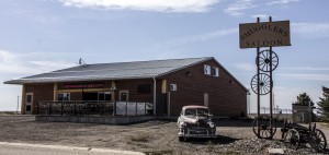 Smuggler's Saloon, the local bar,  with old car parked out front 