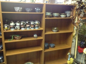 Almost empty shelves of our pottery. 